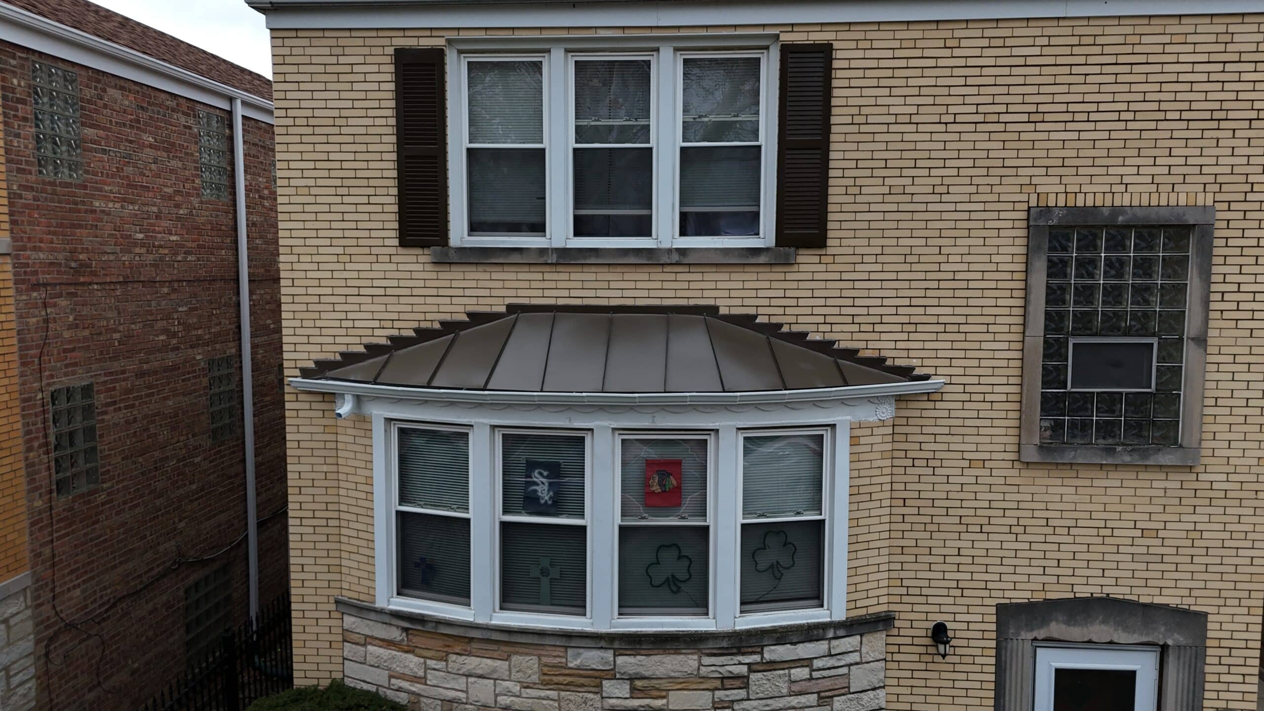 curved copper roof service for bay windows in chicago, expert roofing service